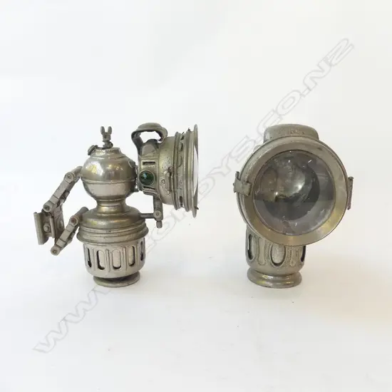 TWO ANTIQUE CARBIDE BICYCLE LAMPS – ‘RIEMANNS PHAENOMEN’ AND ‘POWELL & HANMER CHIEFTAIN’  BIRMINGHAM, GREEN & RED GLASS 