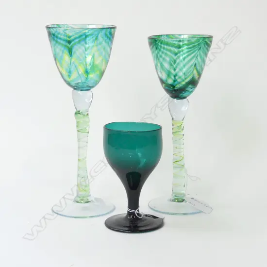 3 GREEN DRINKING GLASSES; 2 FLAMEDAISY (NELSON) NIKAU H.220mm + ANTIQUE GREEN GLASS H.110mm