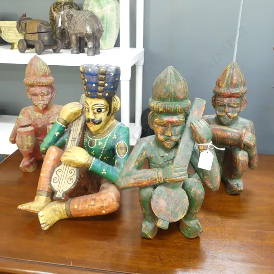4 CARVED WOODEN INDIAN FIGURES H.305mm
