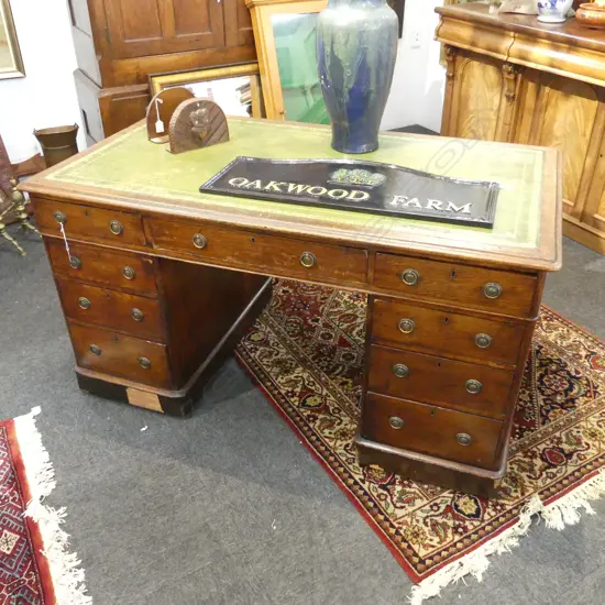 VICTORIAN OAK DOUBLE PEDESTAL DESK, GREEN LEATHER TOP 