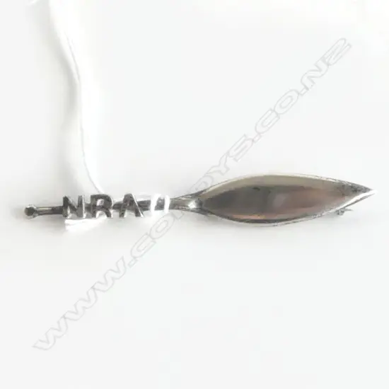 'NRA' SILVER PADDLE FORM BROOCH