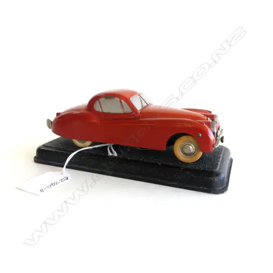 VINTAGE PRAMETA (Germany) CLOCKWORK MODEL of JAGUAR XK120 ON STAND w OFFICIAL KEY ATTATCHED TO UNDERSIDE, 1940-49