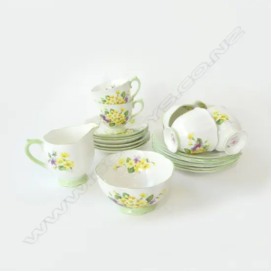 ROYAL ALBERT ‘PRIMULETTE’ BONE CHINA TEA SET 6 CUPS, 6 SAUCERS, 6 PLATES, MILK JUG, AND SUGAR BOWL