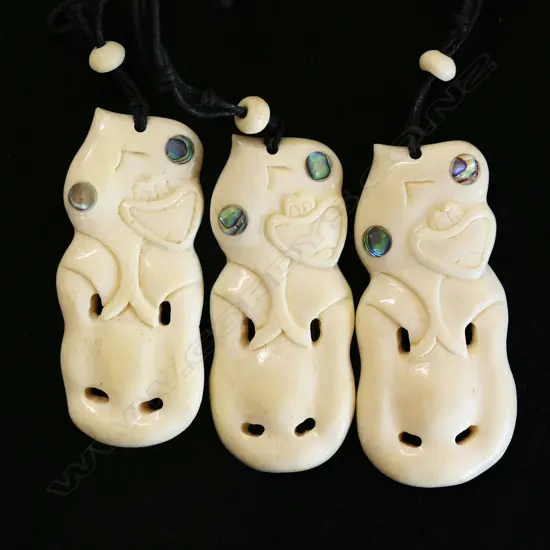 3 CONTEMPORARY BONE HEI TIKI PENDANTS ON LEATHER THONGS new old stock