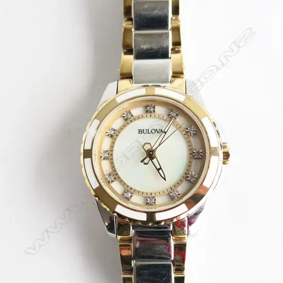 LADIES BULOVA WRIST WATCH w. MOP FACE   (NOT GOING)