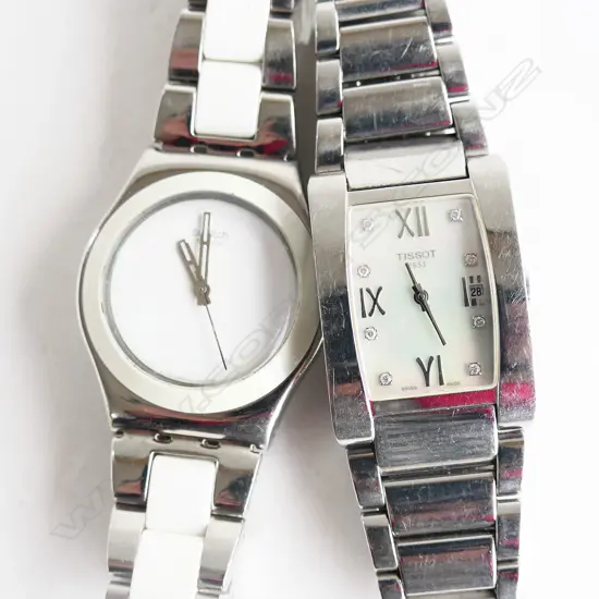 2 LADIES WRIST WATCHES; TISSOT & SWATCH  (not going)