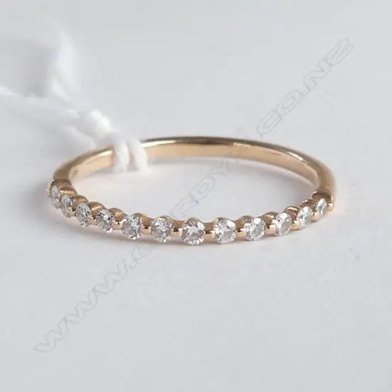 18ct DIAMOND SET BAND 0.20ct, 1.4gm SIZE N