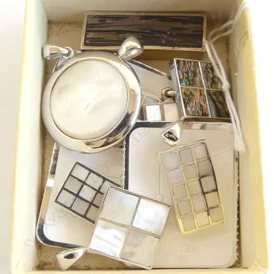 9 SILVER PENDANTS, 7 MOP & 2 OTHERS, new old stock