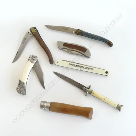 COLLECTION OF 7 FOLDING KNIVES