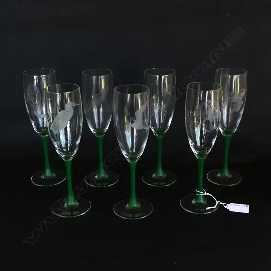 SET OF 7 CHAMPAGNE FLUTES WITH  VARIOUS TYPE OF ETCHED KIWI BIRDS 