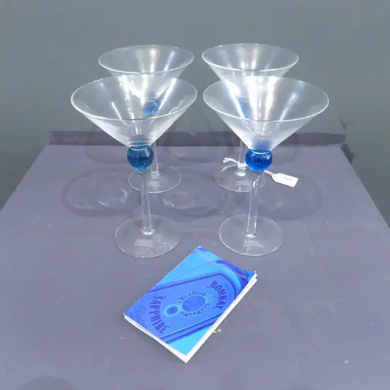 SET OF FOUR BOMBAY SAPPHIRE MARTINI GLASSES WITH BLUE BALL ON STEAM