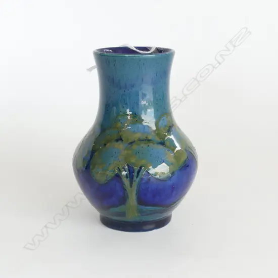 WILLIAM MOORCROFT MOONLIT BLUE VASE green initials H.122mm. hair crack to rim