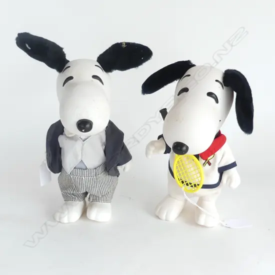 2 SNOOPY HARD RUBBER TOYS: 1 dressed for tennis the other in a tux