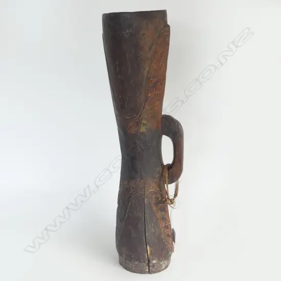 A WOODEN P.N.G KUNDU DRUM WITH NO SKIN H 580 MM