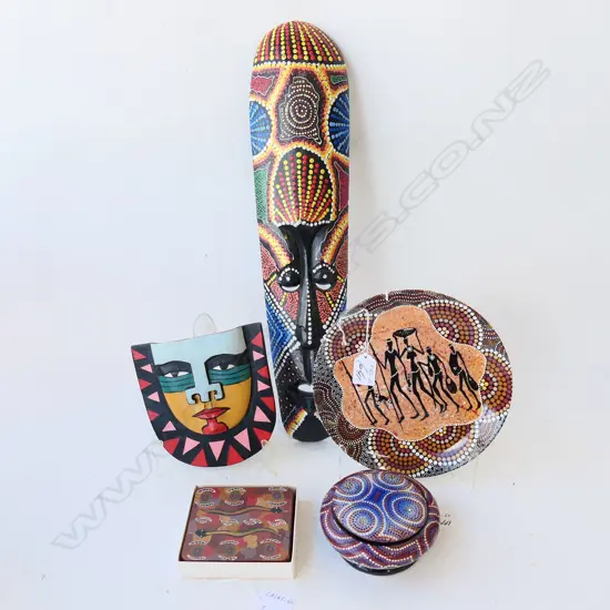 FIVE ABORIGINAL ARTIFACTS, 2 MASKS (LONGEST 49MM) 1 BOX, 1 PLATE AND 1  BOX OF COASTERS