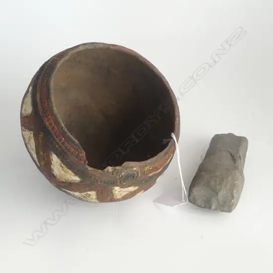 A P.NG POTTERY HAND COLOURED BOWL WITH FAULTS AND SMALL STONE ADZE D 140 MM