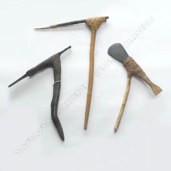 THREE P.N.G HAFTED ADZE ONE STONE ONE METAL AND ONE BONE  L 630 MM