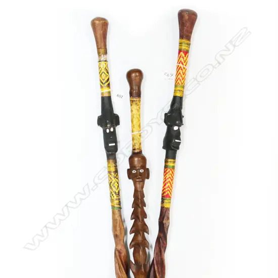 3 CARVED & WOVEN CANE FACED WALKINGSTICKS 980MM TALLEST