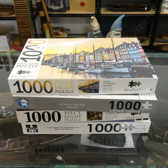 FOUR 1000PC PUZZLES – COPENHAGEN, TEMPLE BHUTAN, CASTLE JAPAN, CASTLEPOINT NZ