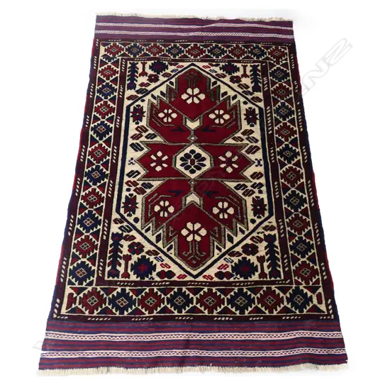 A hand knotted Afghan Burjusta carpet,