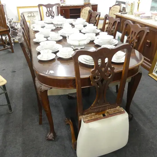 MAHOGANY DINING TABLE w. 8 CHIPPENDALE STYLE CHAIRS ONE CHAIR BROKEN