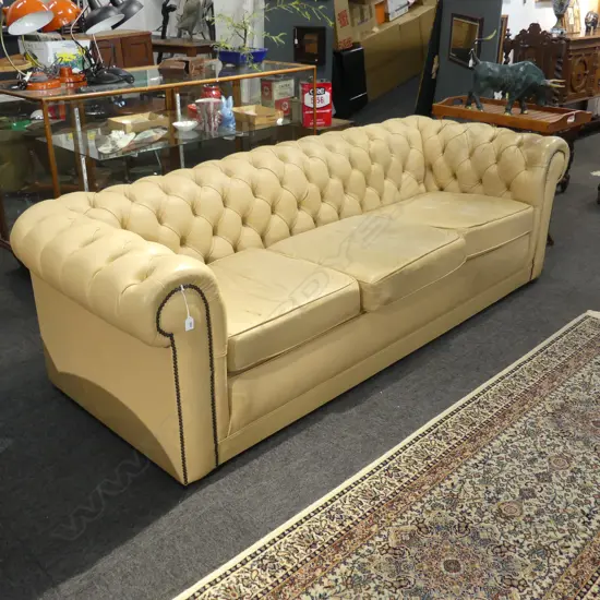 PALE TAN LEATHER 3 SEATER CHESTERFIELD SOFA 2250x900x700mm. some wear