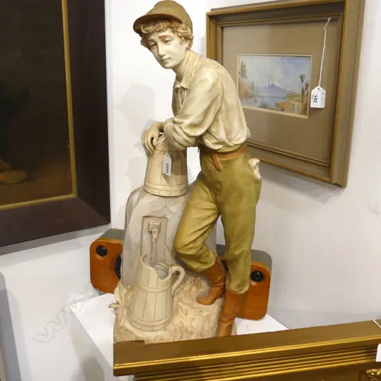 LGE ROYAL DUX FIGURE OF A YOUNG MAN AT THE WELL bisque porcelain gilded & soft toned H.600mm minor chipping to base