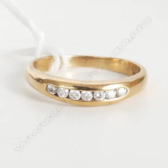 9CT YELLOW GOLD DIAMOND CHANNEL RING 2.33gms