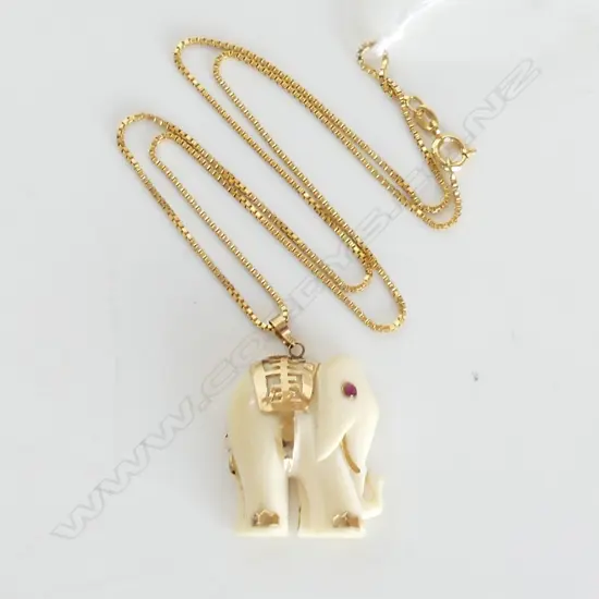 IVORY ELEPHANT PENDANT, RUBY EYE & 14CT HIGHLIGHTS (2.5mm) ON G/PLATE CHAIN