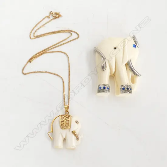 TWO VINTAGE IVORY ELEPHANT PENDANTS