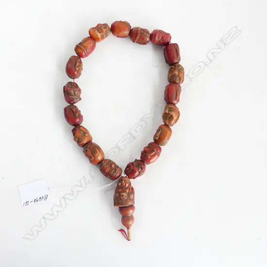 CORAL? CARVED PRAYER BEADS, BUDDHA & HIS ASSISTANTS, OF CONSIDERABLE AGE