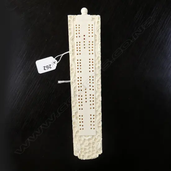ANTIQUE IVORY CRIBBAGE BOARD WITH FINELY CARVED DRAGON BORDER L. 215MM