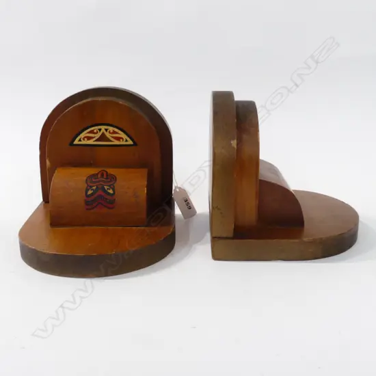 PAIR OF WOODEN  BOOKENDS WITH MAORI MOTIFS  H 130 MM