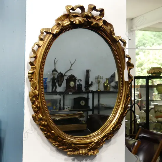 BRASS FRAME OVAL MIRROR 310X400MM