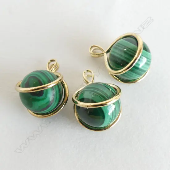 3 9ct GOLD MOUNTED MALACHITE PENDANTS