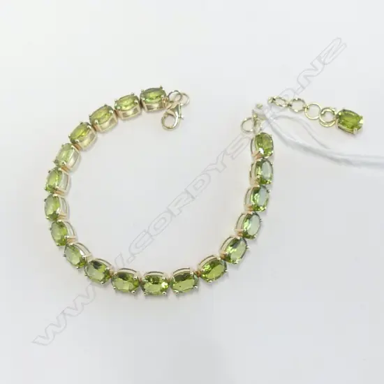 **RTV** 14ct GOLD & PERIDOT TENNIS BRACELET