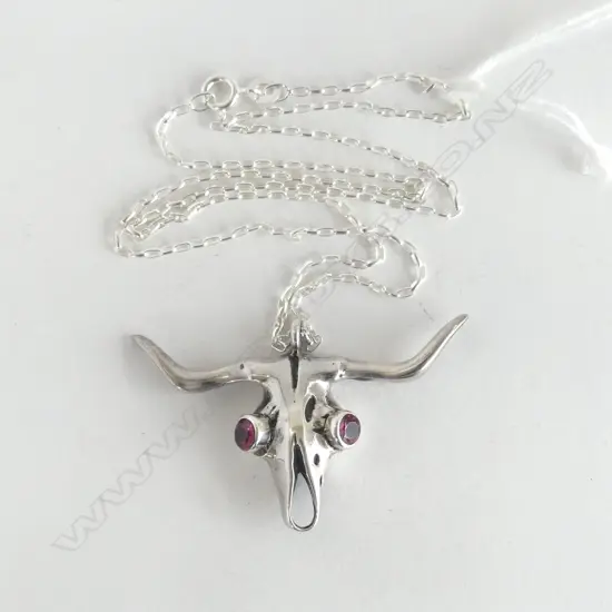 SILVER SKULL PENDANT w PINK STONE EYES ON SILVER CHAIN