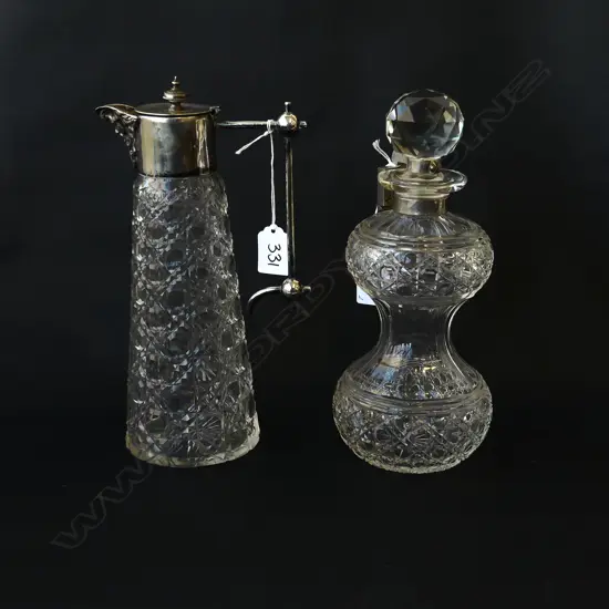 TWO CRYSTAL DECANTERS(PROBABLY 1920s), ONE WITH INTEGRATED LOCKING SYSTEM (H.275mm) & OTHER WITH GEORGIAN STYLE SPOUT, H