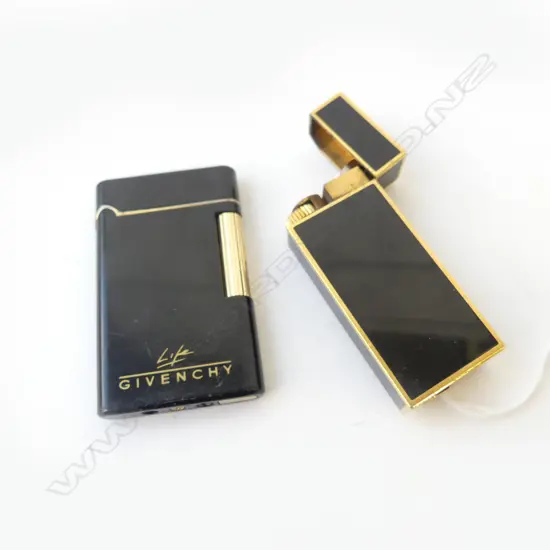 2 BLACK & GOLD LIGHTERS; CARTIER & GIVENCHY H.60mm
