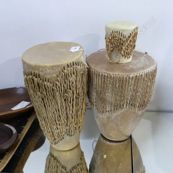 GROUP OF 3 SKIN COVERED HAND DRUMS TALLEST 300MM