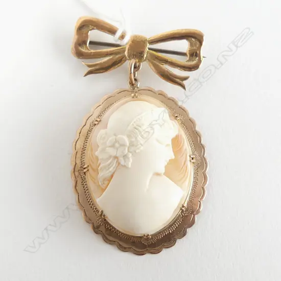 9CT FRAMED CAMEO W 9ct BOW BROOCH 8.15gms