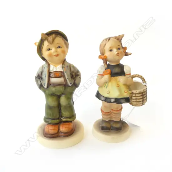 TWO HUMMEL GOEBEL FIGURINES BOY IN LEDERHOSEN & GIRL WITH BASKET, H.140MM H.130MM