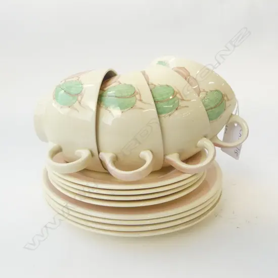 FOUR SUSIE COOPER ‘PATRICIA ROSE’ TRIOS – 4 CUPS, 4 SAUCERS, & 4 PLATES, D.170MM