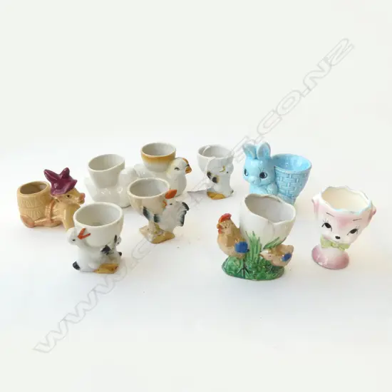 NINE VINTAGE EGG CUPS – ROOSTERS, DONKEY, DUCKS, CHICKEN ETC