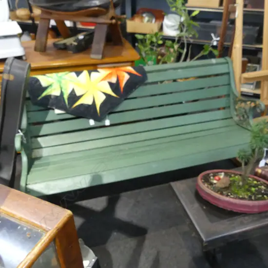 GREEN PAINTED GARDEN BENCH, CAST IRON ENDS W.1440mm