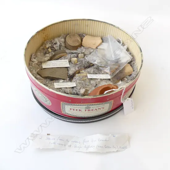 TIN OF ROMAN ARTIFACTS