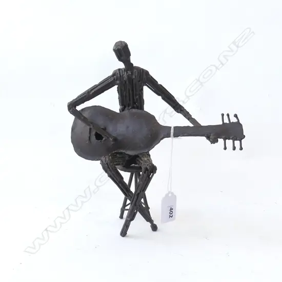 BRONZED SMALL STATUE SEATED GUITARIST H220MM