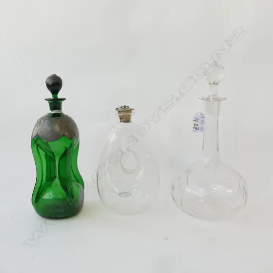 THREE DECANTERS ONE HOLMGAARD ( CLOUDY), HOGLAND ' GLUGGLUG' TYPE  GREEN WITH PEWTER MOUNTS H.260mm & OTHER H.280mm