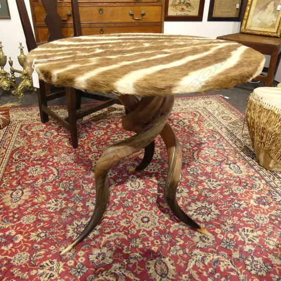 SIDE TABLE; ZEBRA HIDE TOP w. 3 HORN BASE H.600mm 620mm dia