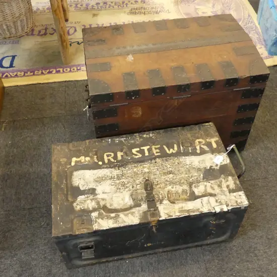 TWO LARGE TRUNKS ONE SILVER STORAGE CHEST  WITH METAL STRAPPING & A METAL ONE . `